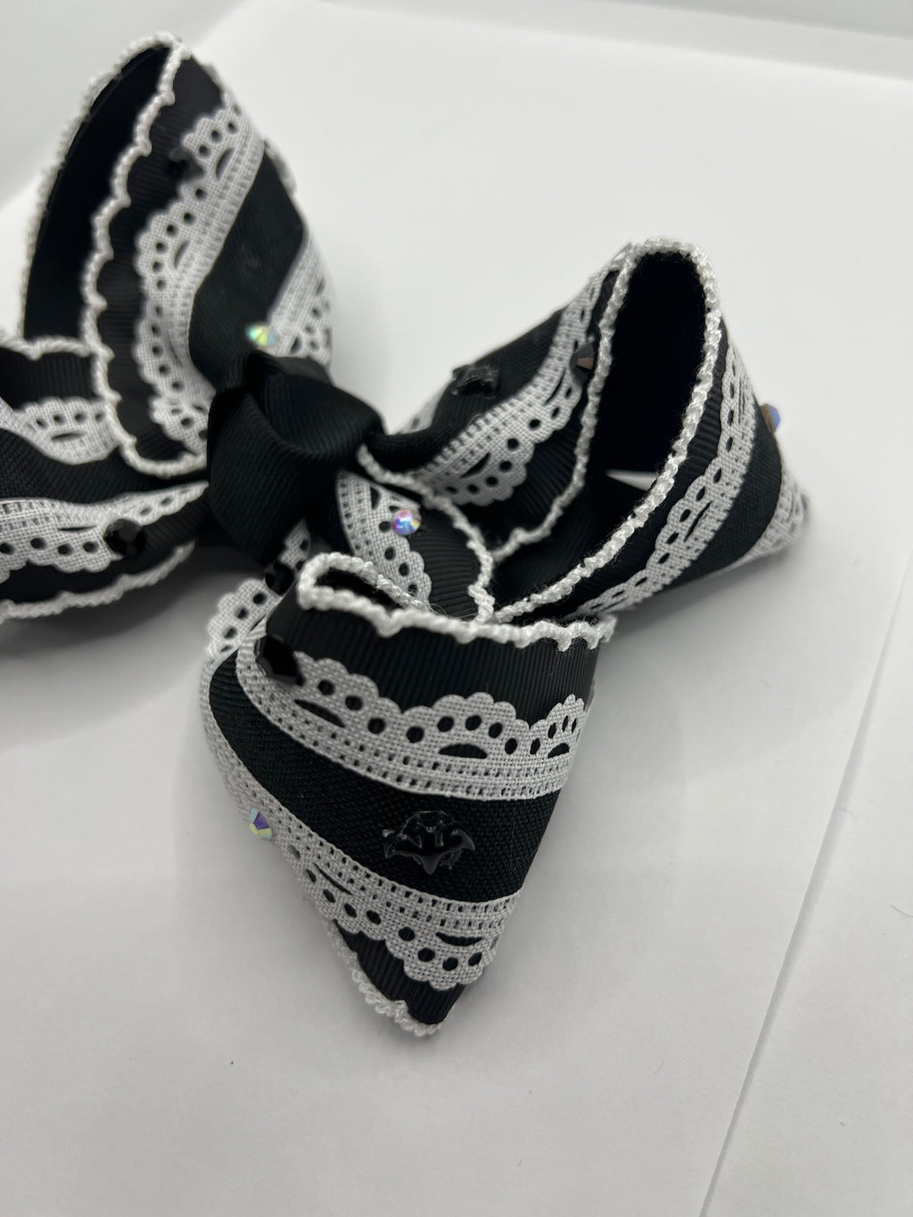 5 1/2” glitzy glam bats on clip