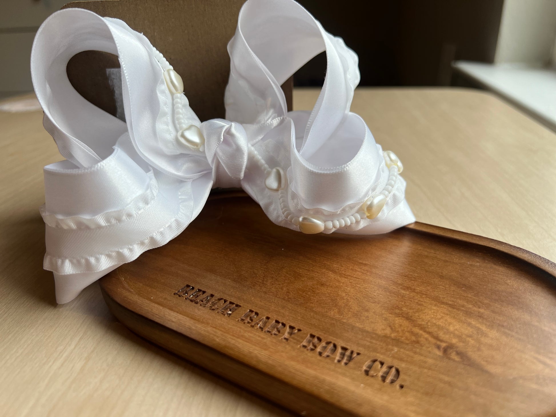 Whimsical white bow 🤍