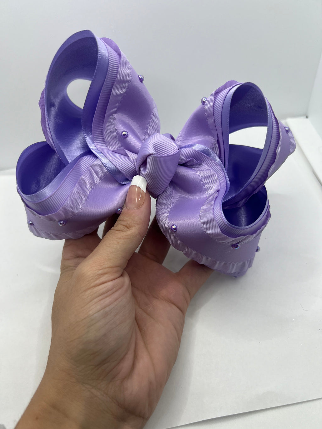 5 1/2” prissy in purple on clip