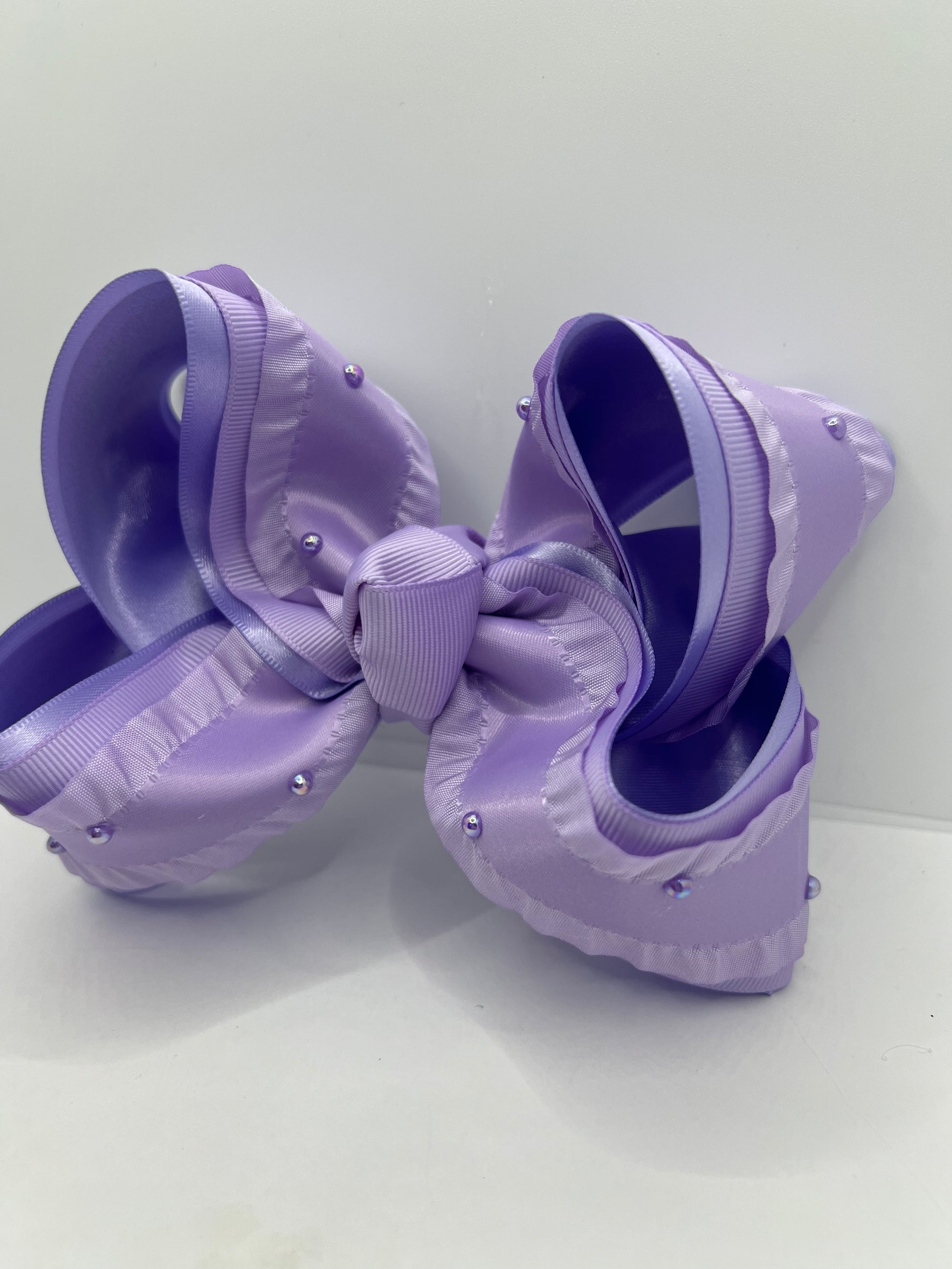 5 1/2” prissy in purple on clip