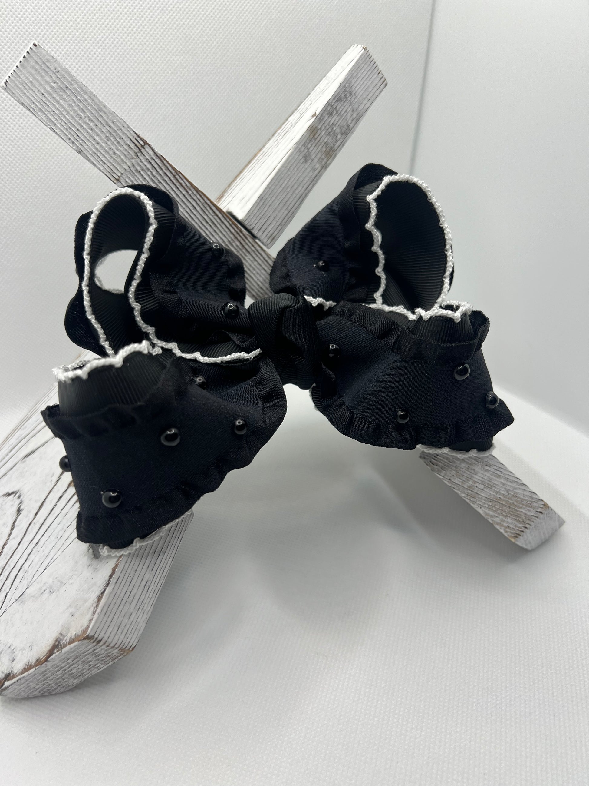 4 1/2” little black bow on clip