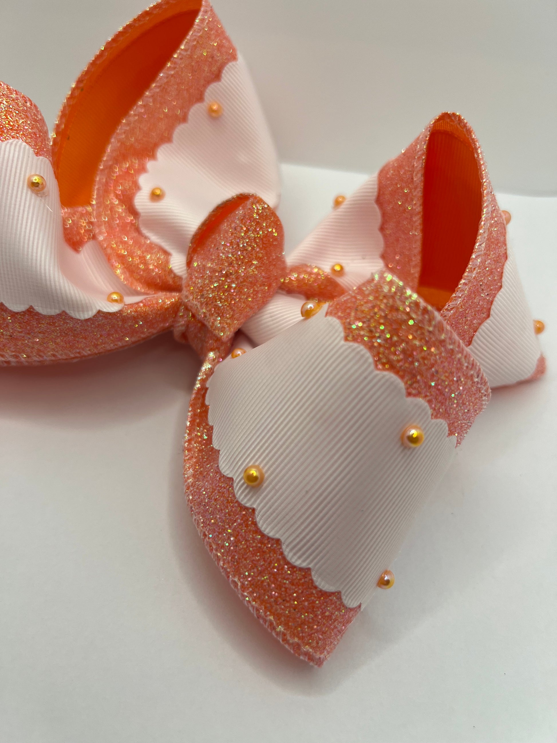 5 1/2” peach pearls on clip