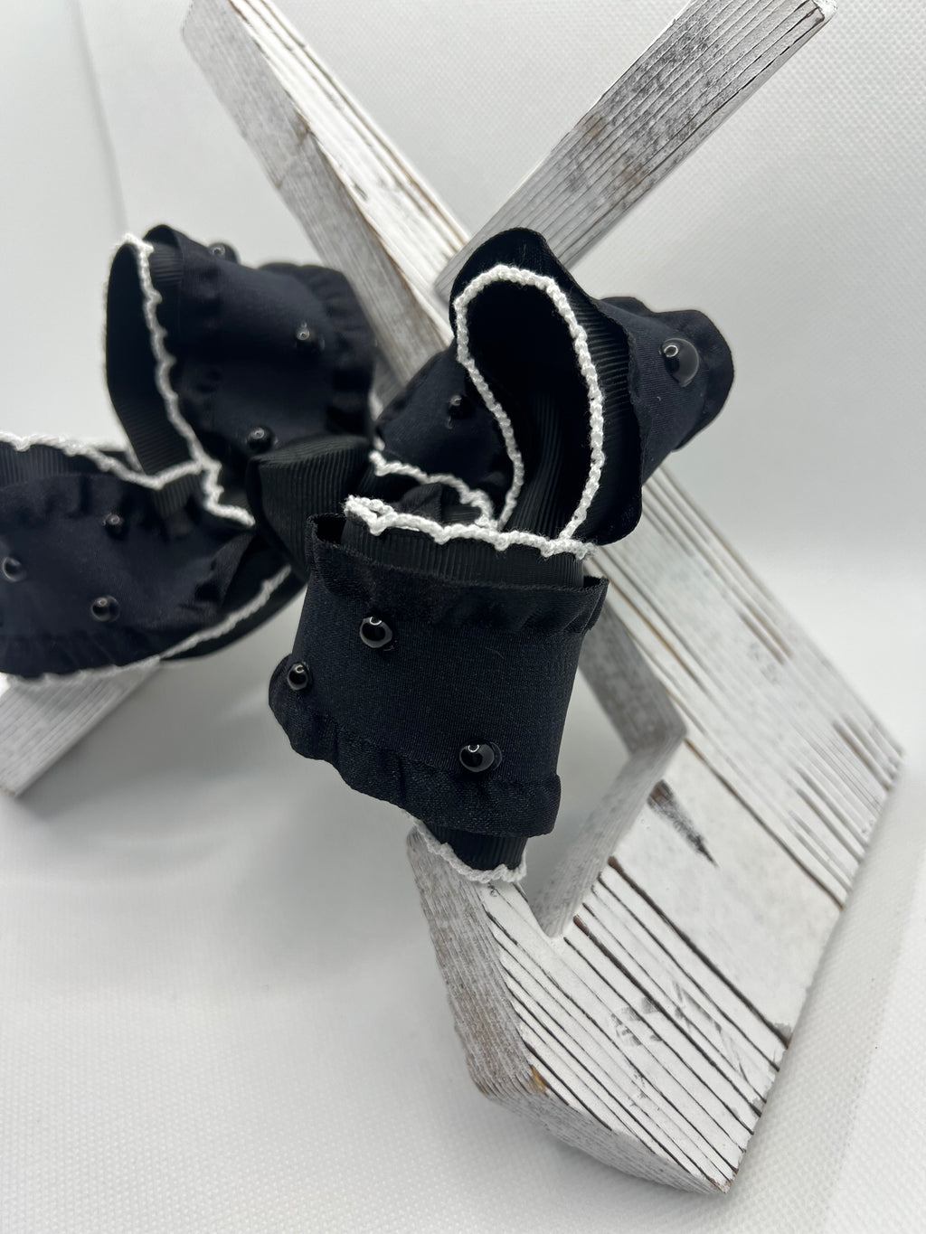 4 1/2” little black bow on clip
