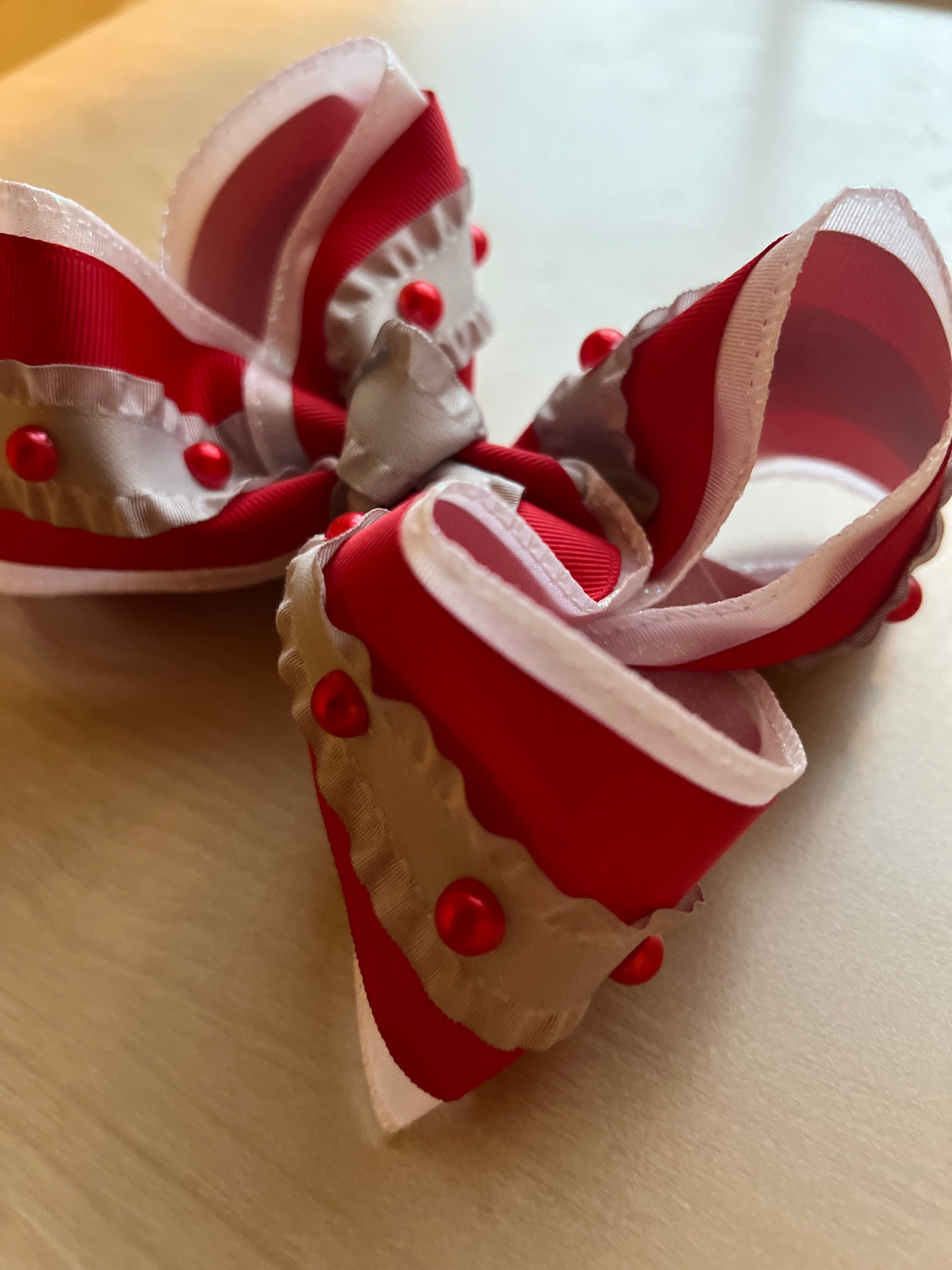 5 1/2 inch grey and red bow on clip