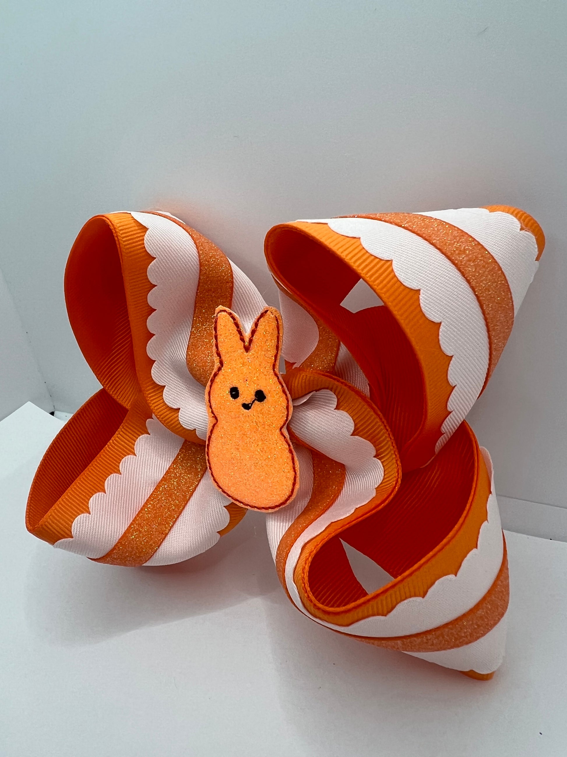 4 1/2” orange bunny scallops on clip
