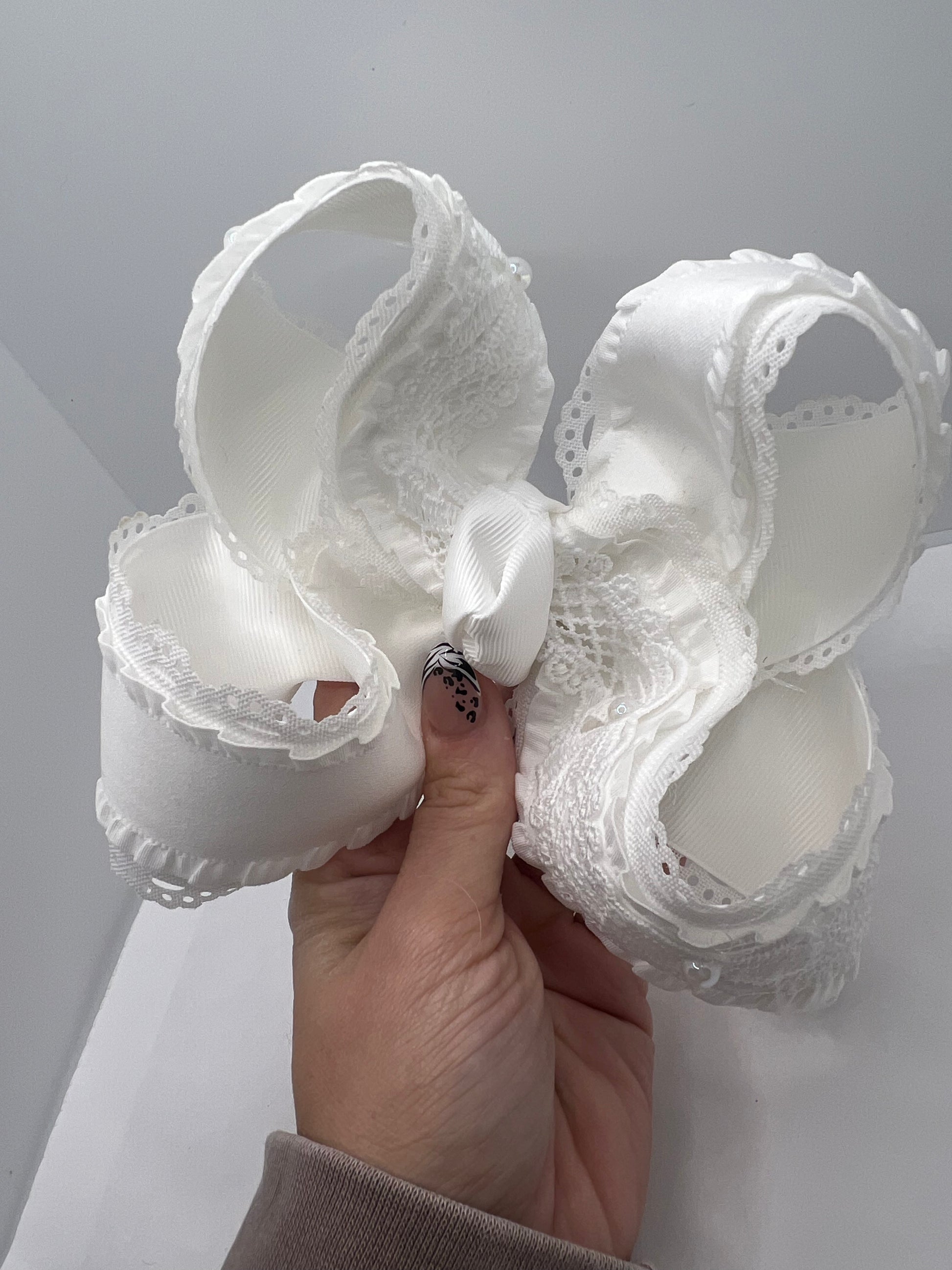 5 1/2” discounted white bow on clip